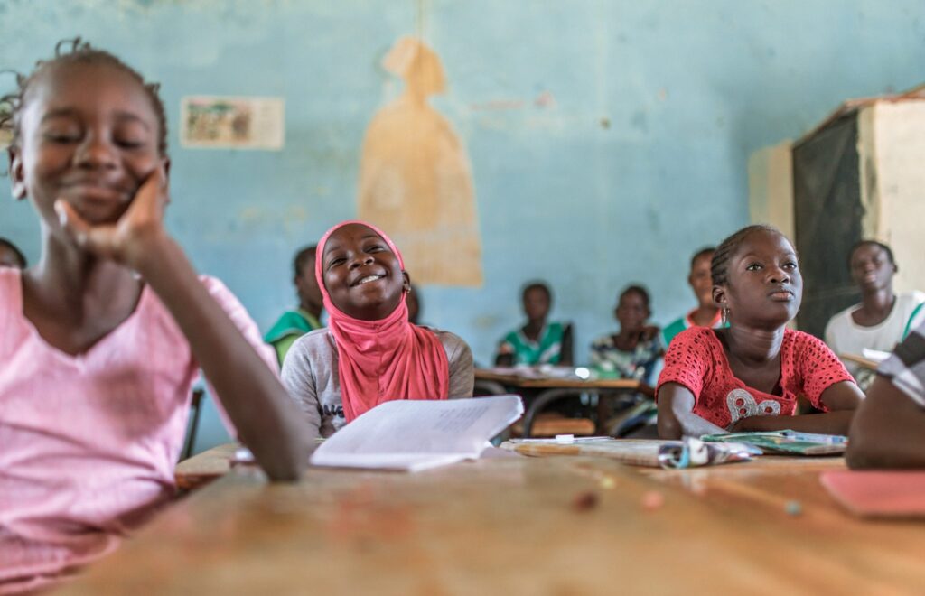Happy young girls in a classroom